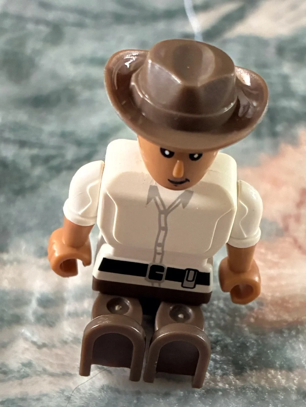 Brown and White Cowboy Figure Mini Toy